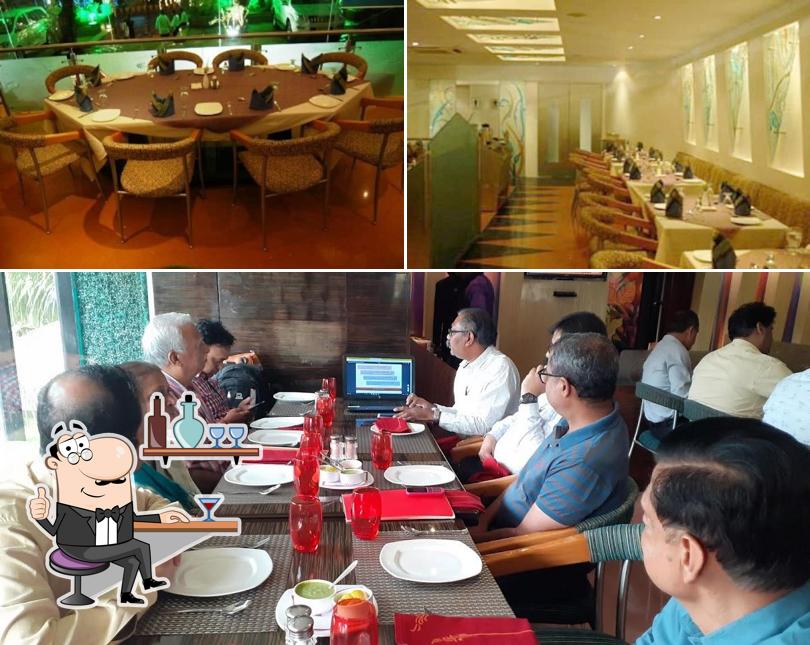 Take a seat at one of the tables at Pride Restaurant