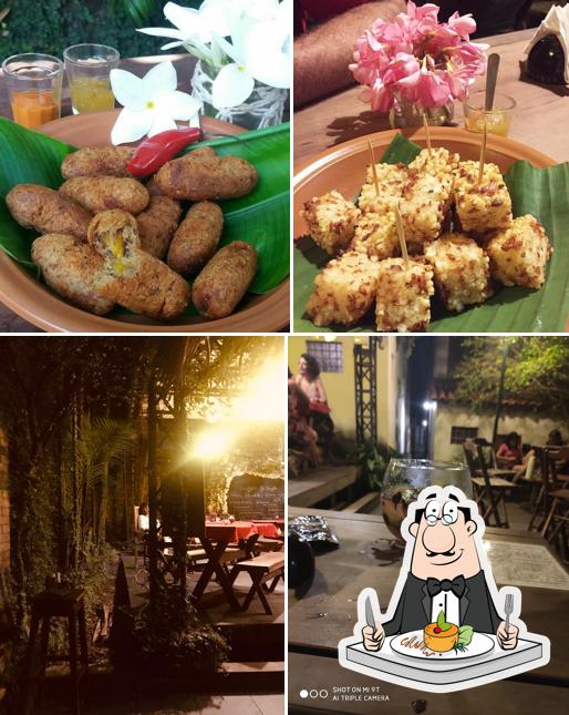 Esta é a ilustração apresentando comida e mesa de jantar no O Holandês Voador