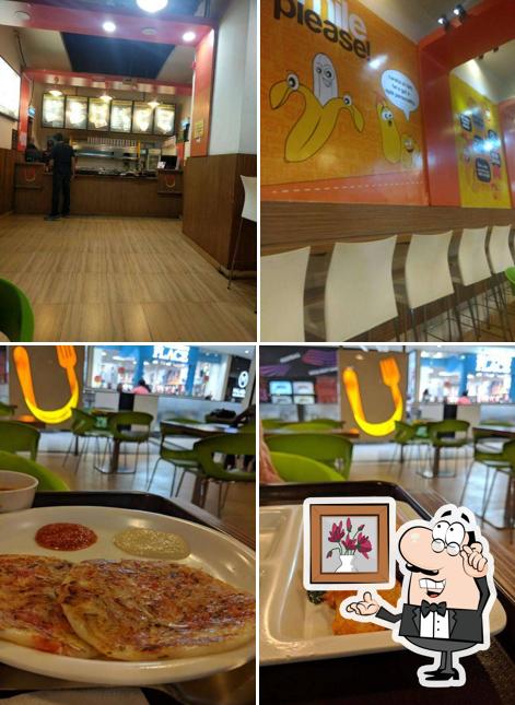 Take a seat at one of the tables at Upsouth Phoenix Mall Pune