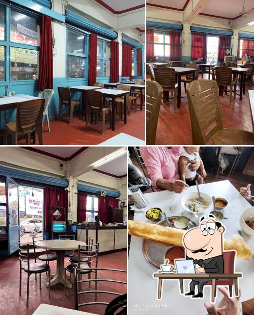 Take a seat at one of the tables at Indian Coffee House Co-operative Society
