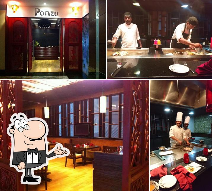 Take a seat at one of the tables at Ponzu Restaurant