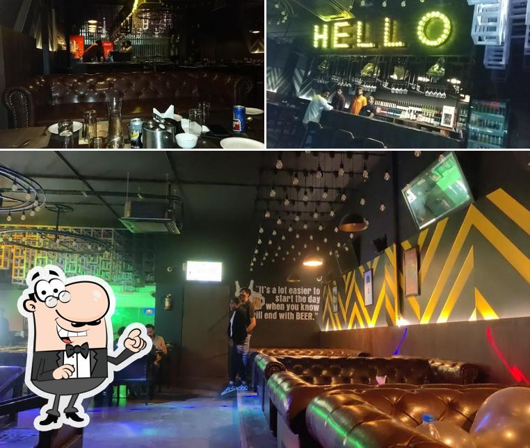 Take a seat at one of the tables at Twist Bar & Lounge