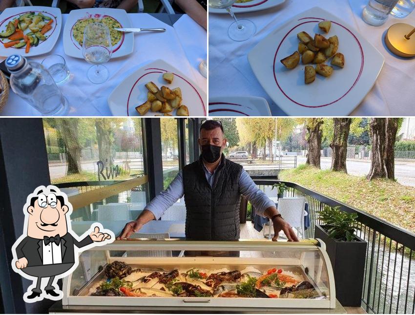 La foto della interni e cibo di Riva 75