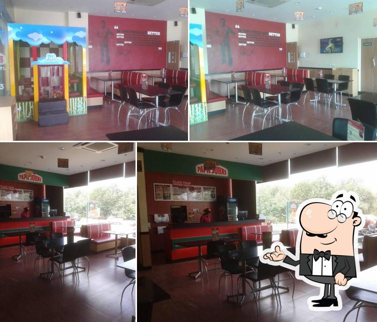 The interior of Papa John's Pizza