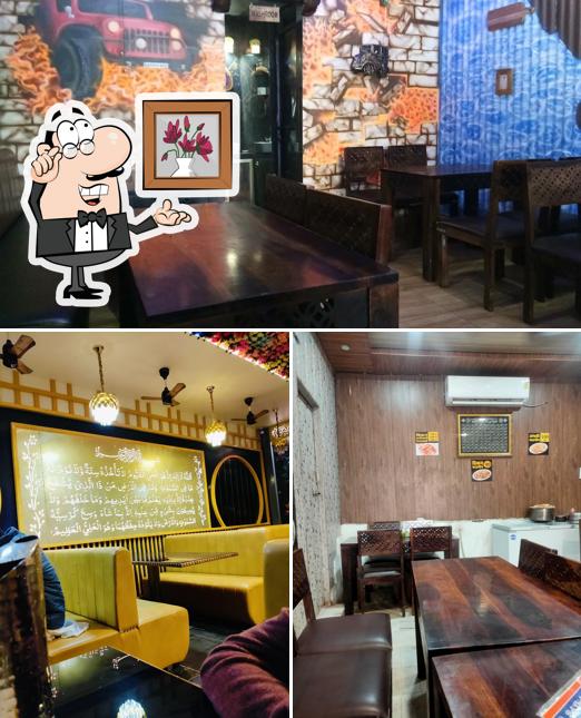 Take a seat at one of the tables at Beli chicken