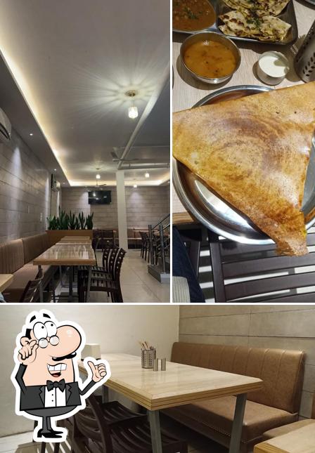 Among various things one can find interior and food at SATTVIK FLAVORS FAMILY RESTAURANT