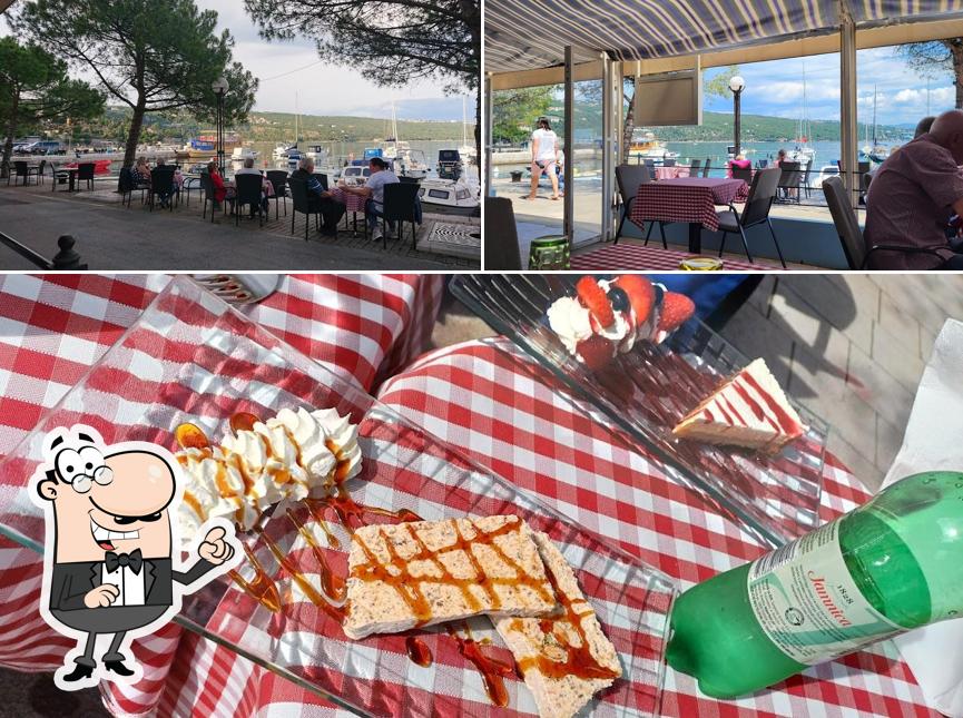 Tra le varie cose da Restaurant Mili si possono trovare la interni e cibo