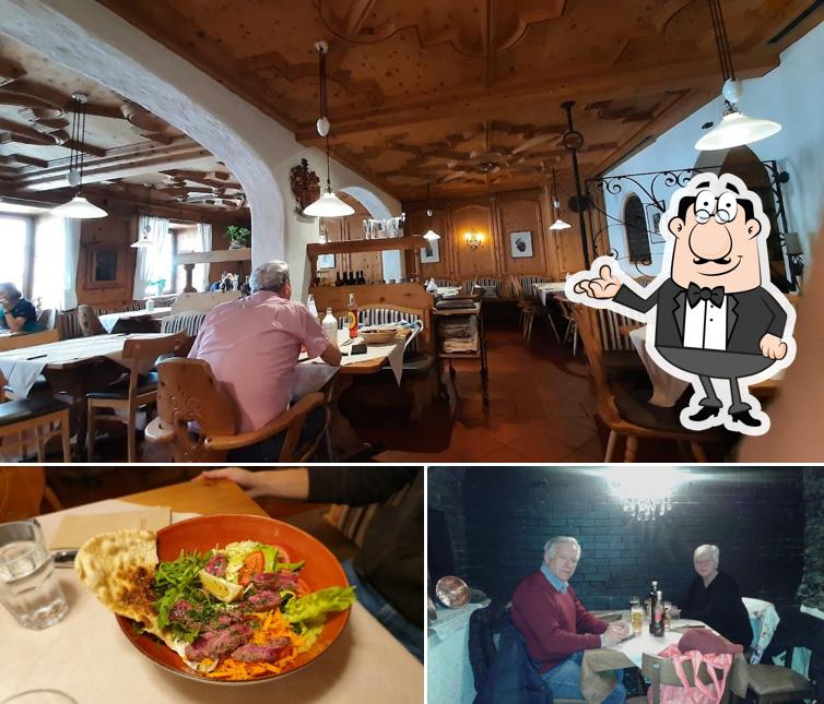 Questa è la immagine che presenta la interni e cibo di Ristorante al Leone D’Oro