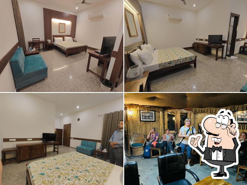 Take a seat at one of the tables at Hotel Sunbird