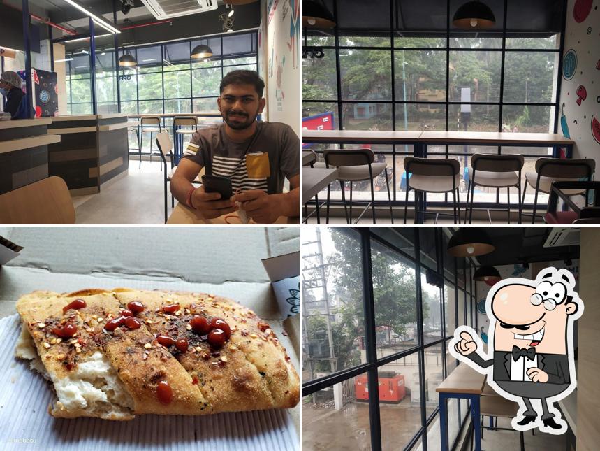 Check out how Domino's Pizza Hattuba Habra North 24, parganas looks inside