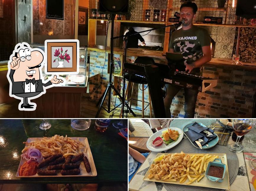 Questa è la immagine che raffigura la interni e cibo di Manufaktura Restoran-Pivnica