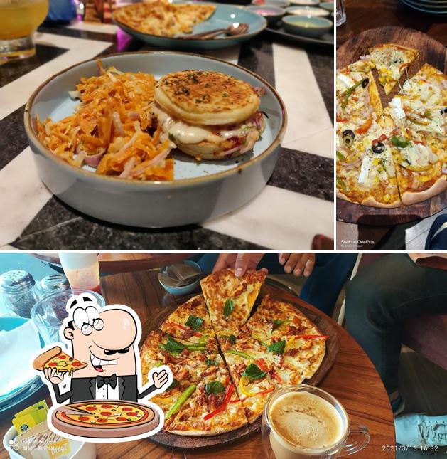 Try out pizza at Kala Ghoda Cafe Best Cafe in Chandigarh