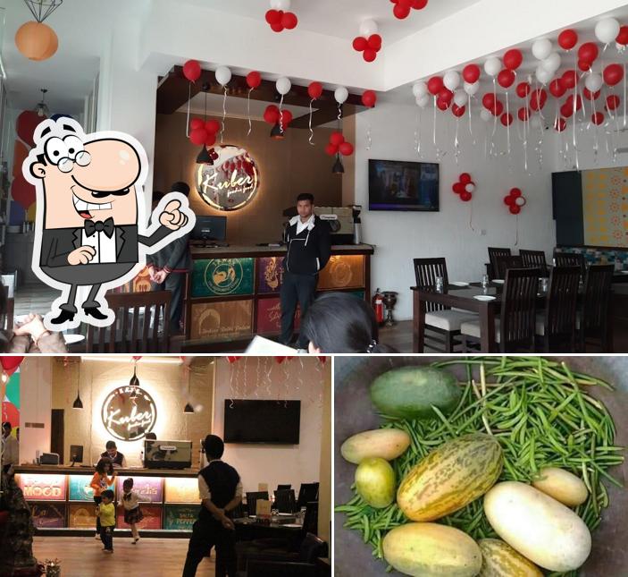 Among various things one can find interior and food at Kuber Café
