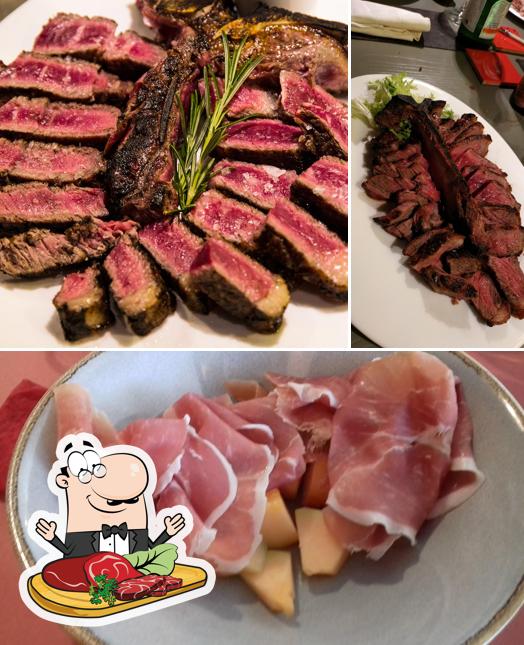 Ordina i piatti di carne a Autostop Caffè & Grill