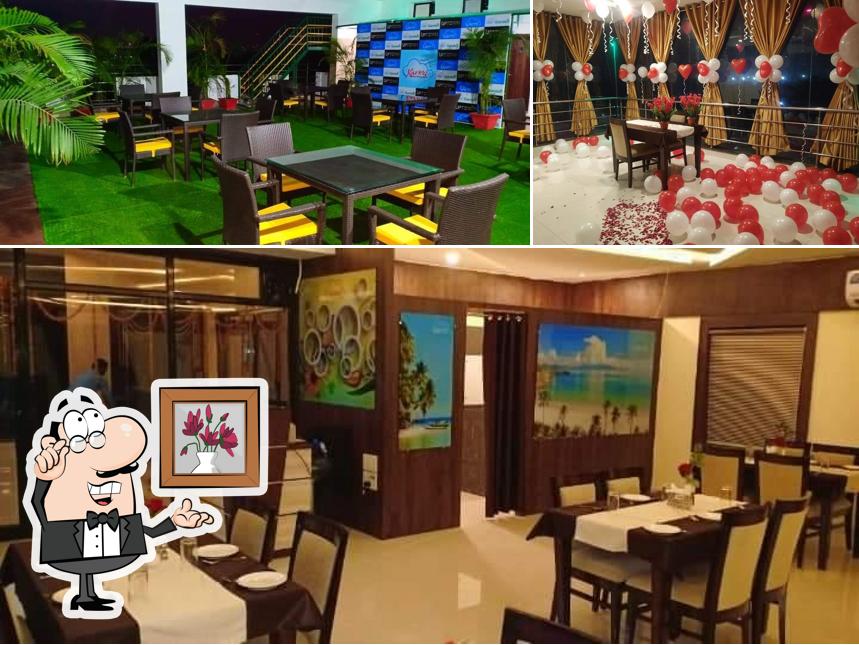 Take a seat at one of the tables at Kaveri Restaurant
