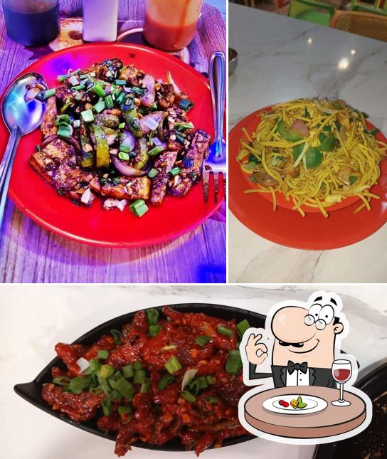 Check out the image displaying food and beverage at Delicious Foodvilla