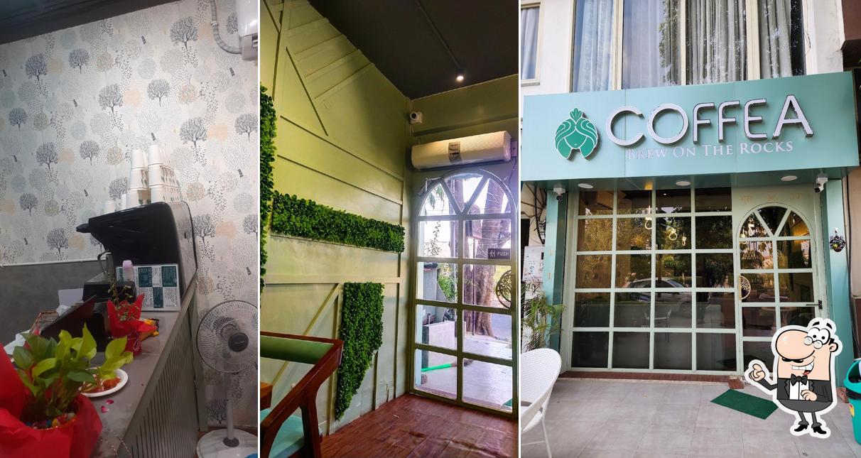 Take a seat at one of the tables at COFFEA JAIPUR-Mansarovar