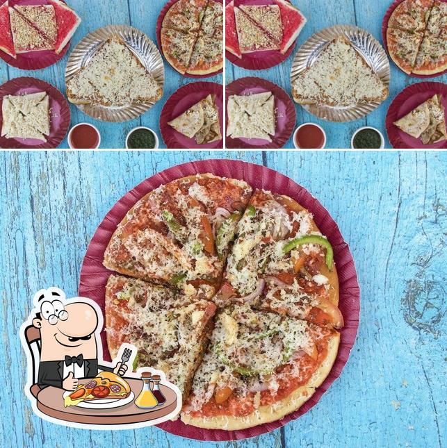 Pick pizza at Om Sai Food Feasta