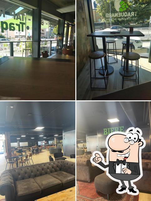 Dai un'occhiata agli interni di Traquenard Tap Room
