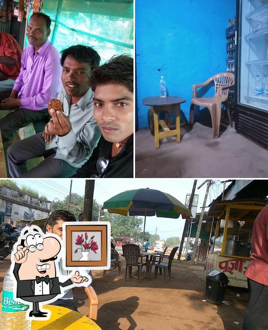 Take a seat at one of the tables at Sahu Tea Stall arang
