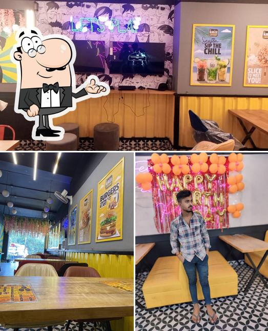 Take a seat at one of the tables at The burger company