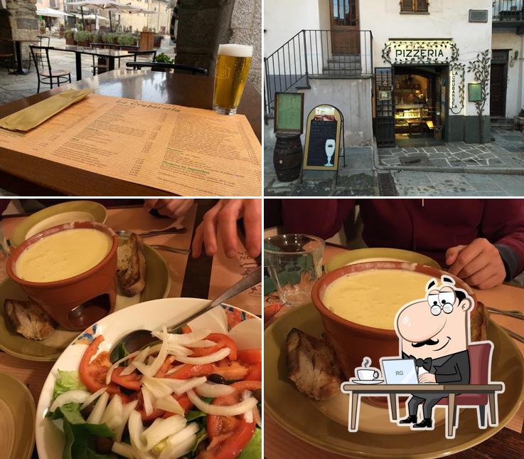 Siediti a un tavolo di Pizzeria La Crubarsela