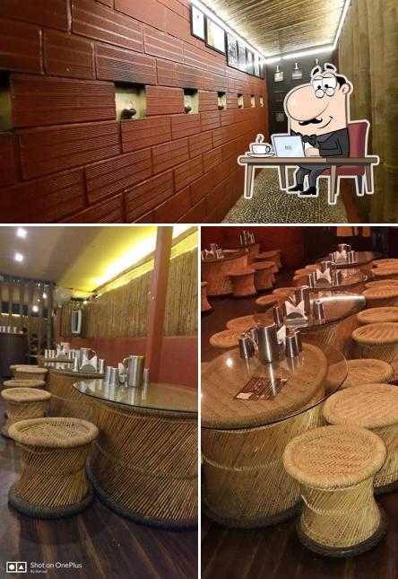 Take a seat at one of the tables at Chulha Chauki Da Dhaba - Authentic North Indian Food AECS Layout