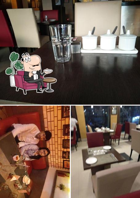 Take a seat at one of the tables at Yo China