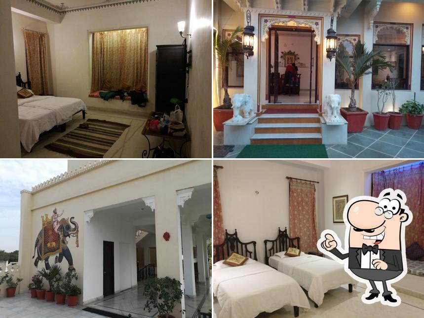 Take a seat at one of the tables at Hotel Boheda Palace - Budget Heritage Hotel In Udaipur