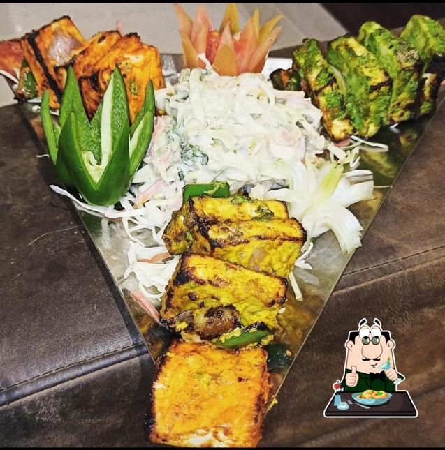 Grilled salmon at Hotel Fauji Bar and Restro