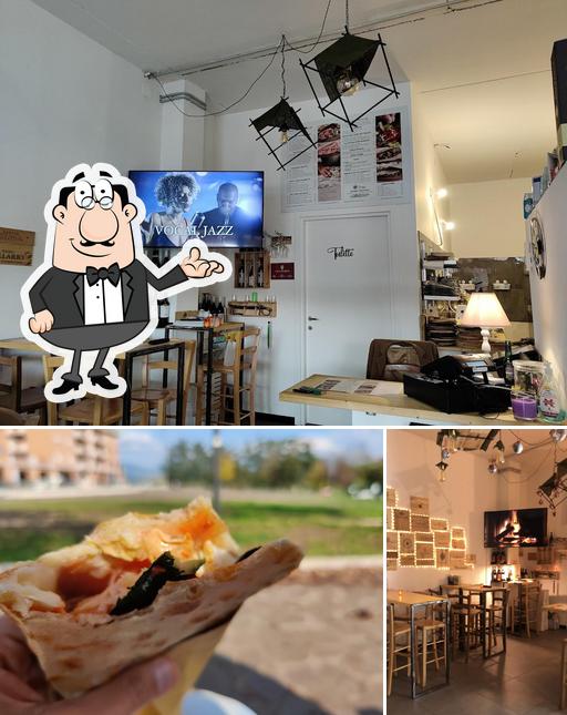 Questa è la foto che presenta la interni e cibo di Piadineria Artigianale