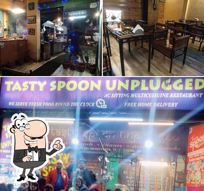 Take a seat at one of the tables at Tasty spoon unplugged