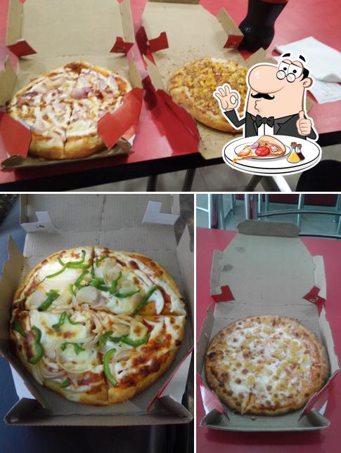 Try out pizza at Dominick Pizza