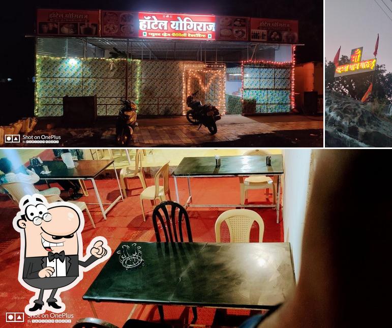 Take a look at the photo depicting interior and fish at Hotel Yogiraj Pure Veg Restaurant