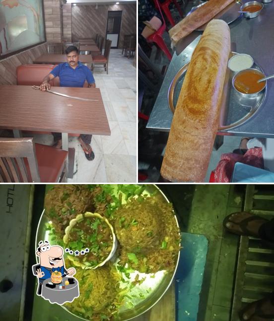 Among different things one can find food and dining table at Kanha Snacks Bar