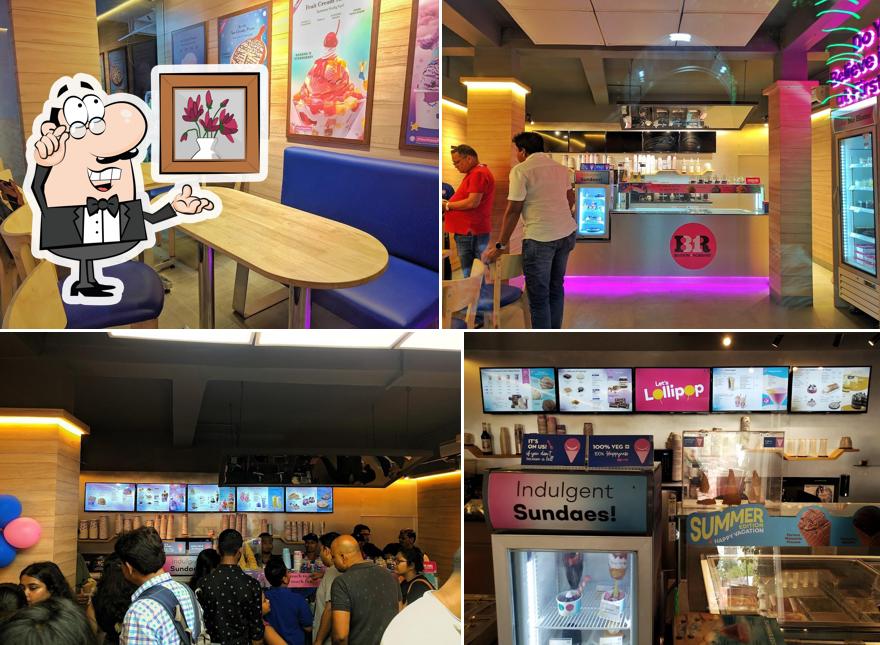 Take a seat at one of the tables at Baskin Robbins