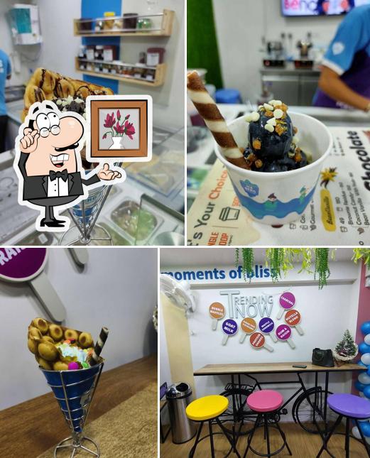 This is the picture depicting interior and food at Ice Berg Ice Creams