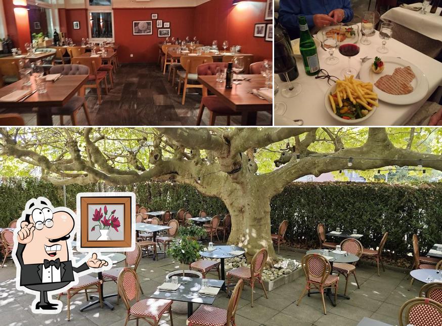 La foto della interni e tavolo da pranzo di Cucina Milchbuck