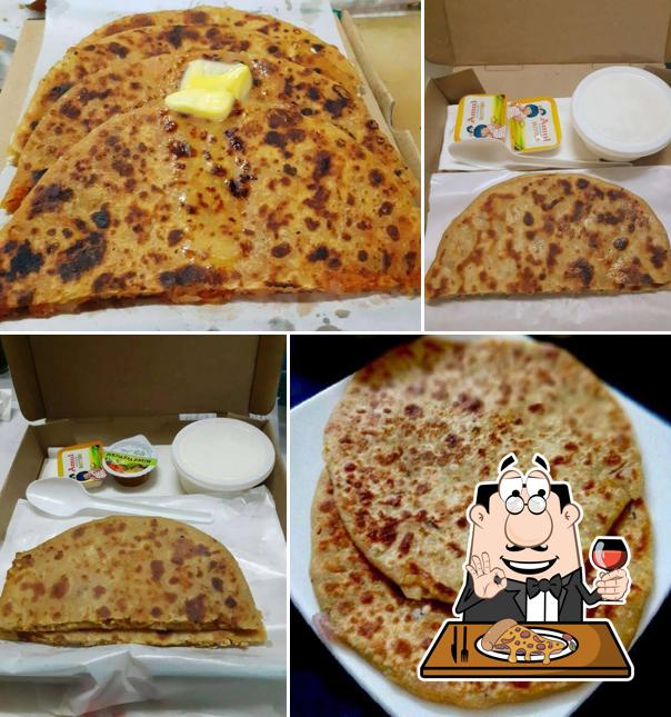 Pick pizza at world of paratha