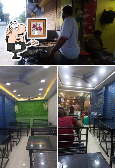 Take a seat at one of the tables at Alif Restaurant