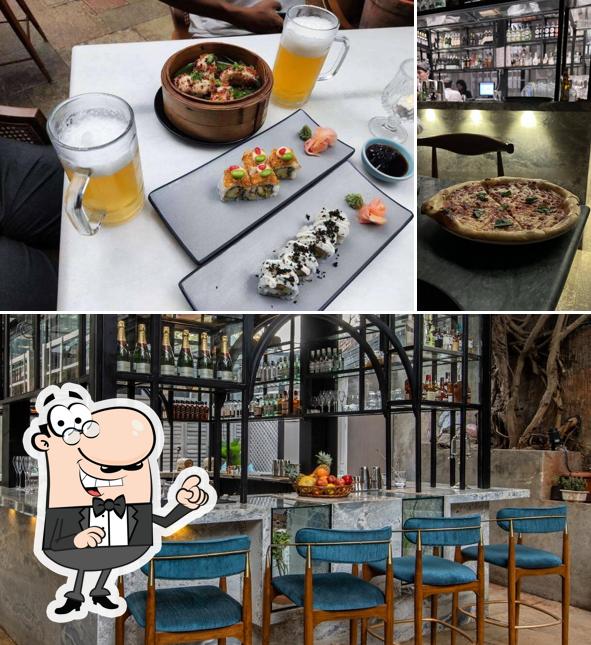 Take a seat at one of the tables at PCO Cocktail Bar