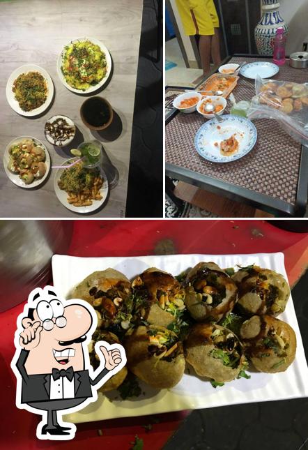 Take a look at the picture displaying interior and food at Gupta Chats