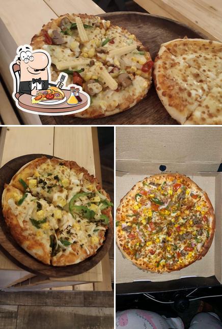 Try out pizza at Hot and Fresh Canadian Pizza