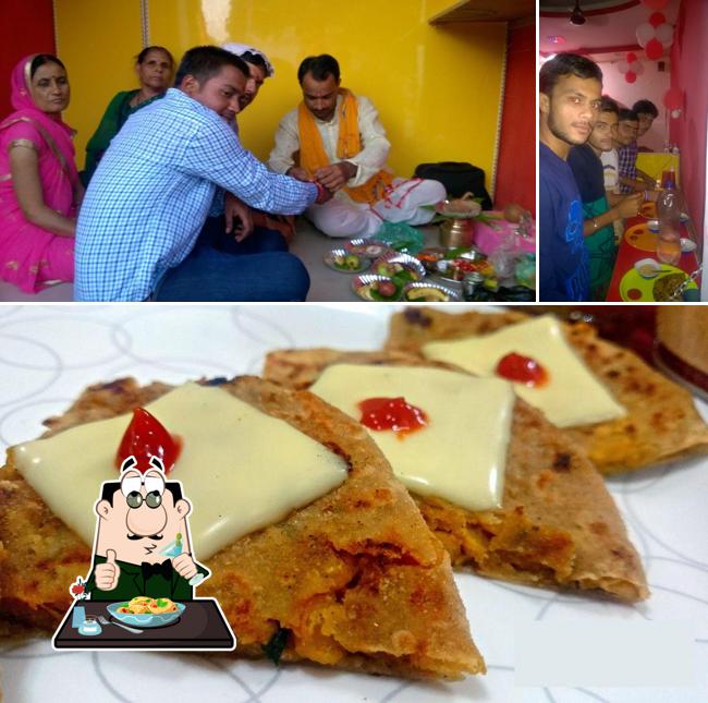 The photo of Engineer's paratha house’s food and dining table