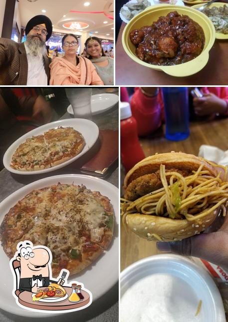 Order pizza at Hungry Bites Snack Bar