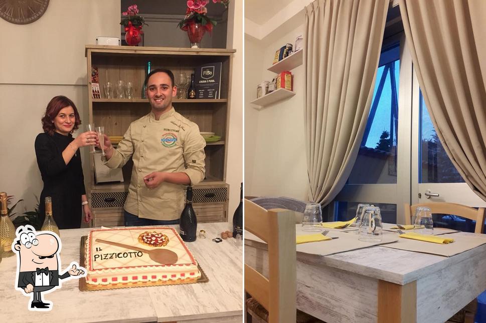 Siediti a un tavolo di Pizzeria Il Pizzicotto