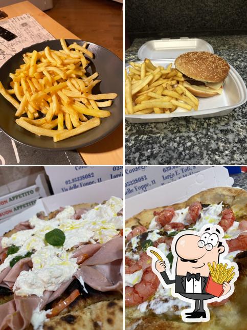 Assaggia un piatto di patatine a Pizza al Volo