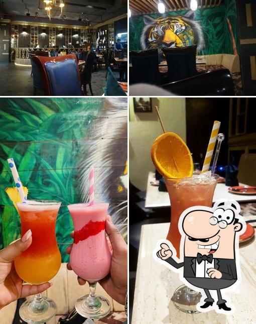 Take a look at the picture depicting interior and drink at Ethnic Coriander's Mint