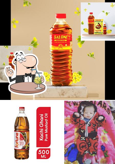 The picture of MAHEEN ONLINE SERVICE AND KIRANA STORES’s drink and food
