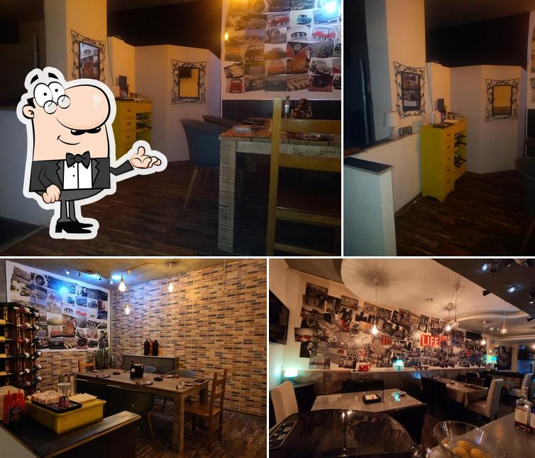 Installez-vous à l'une des tables de FROG Caffe Pizzeria